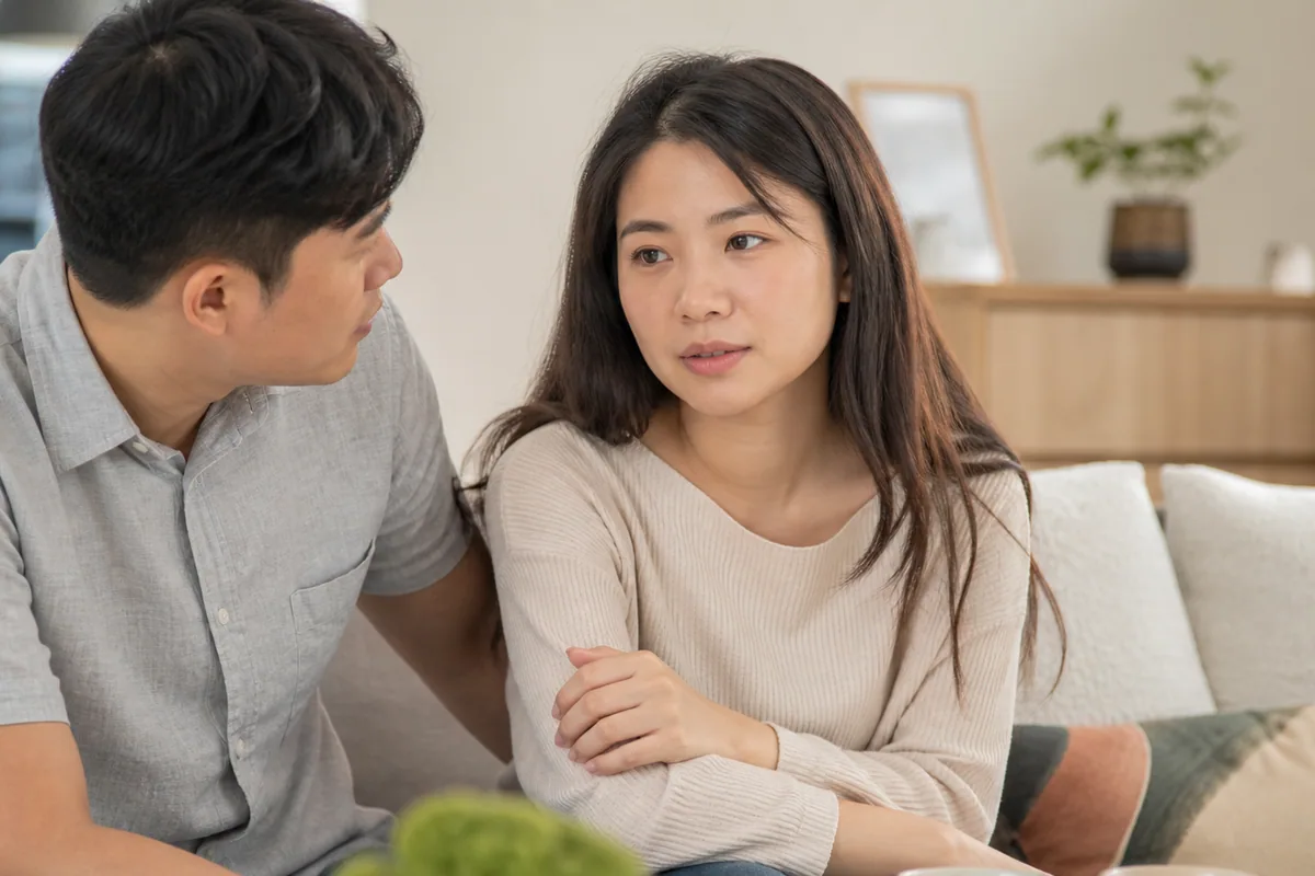 Malaysian Chinese woman discussing family planning with her partner